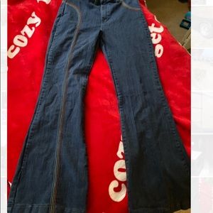 Highwaisted bellbottoms with rainbow stitching these are like new